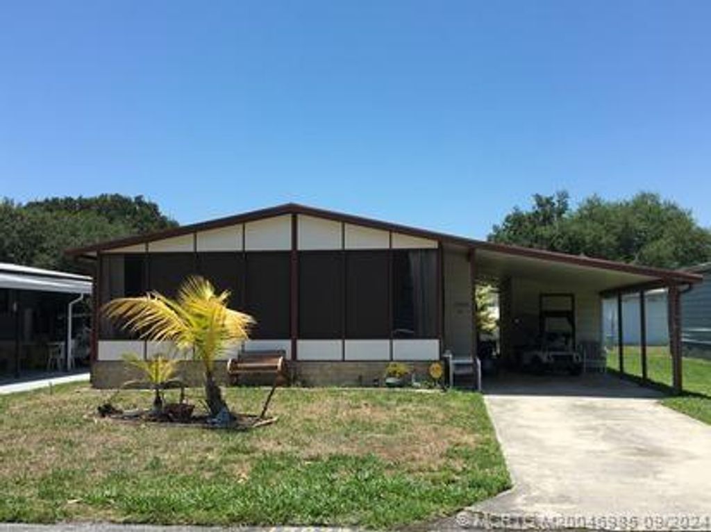 Photo of 15925 Indianwood Circle SW, Indiantown, FL 34956 (MLS # M20046985)
