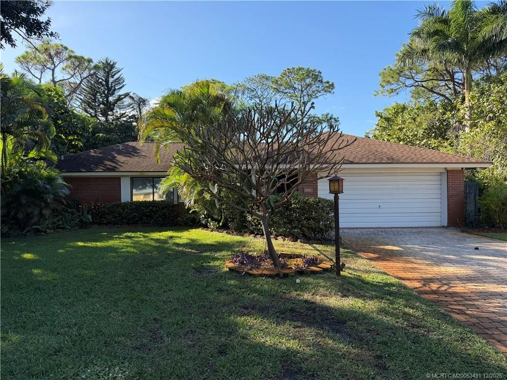 Photo of 1444 NW Spruce Ridge Drive, Stuart, FL 34994 (MLS # M20053491)