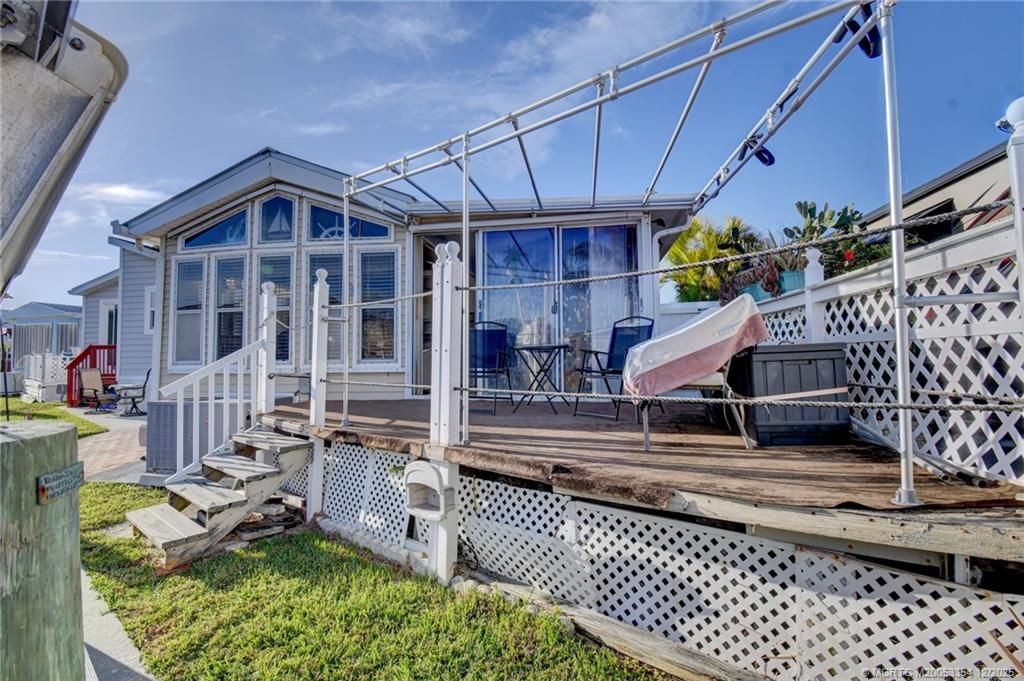 Photo of 1081 Nettles Boulevard, Jensen Beach, FL 34957 (MLS # M20053354)