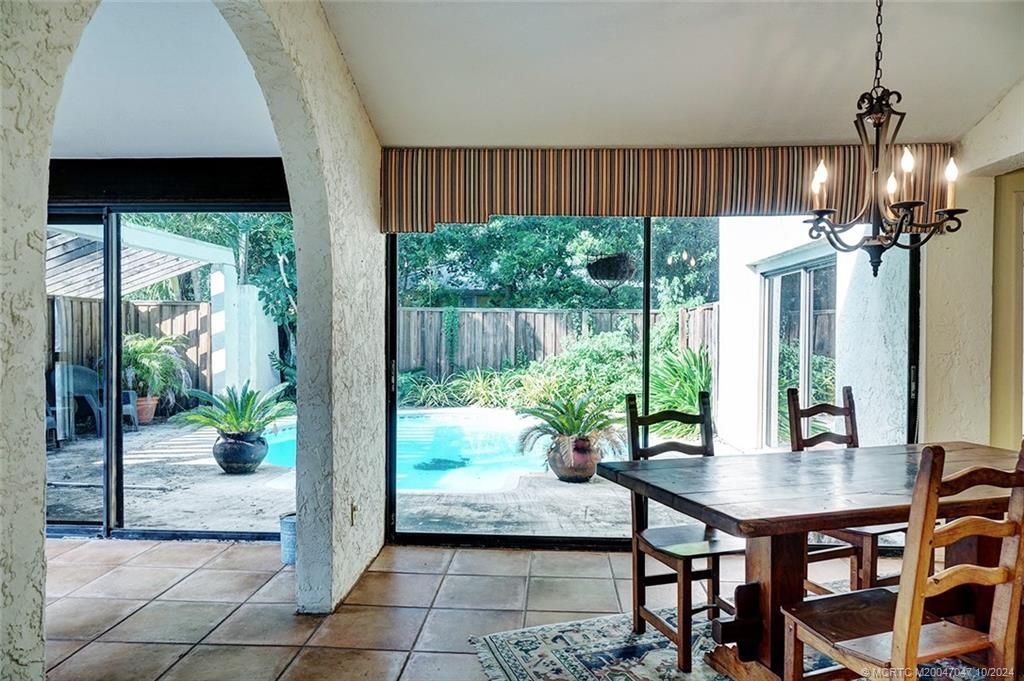 Photo of 10 Emarita Way, Stuart, FL 34996 (MLS # M20047047)