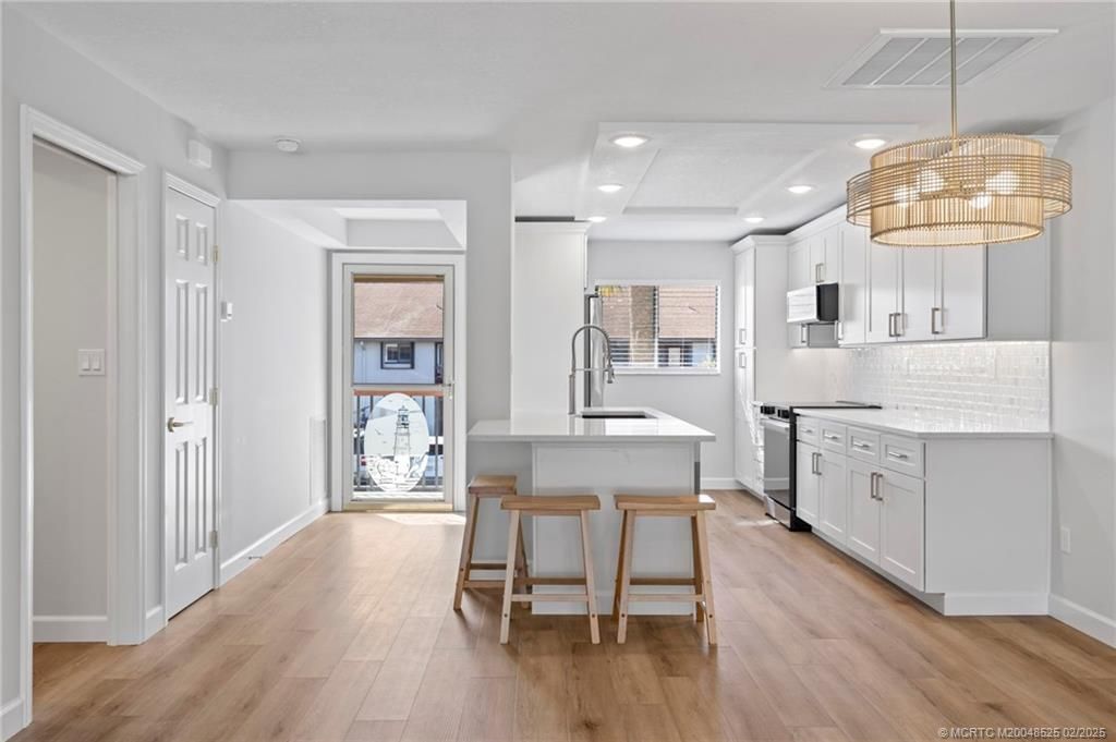 Photo of 1600 NE Dixie Highway #13-206, Jensen Beach, FL 34957 (MLS # M20048525)