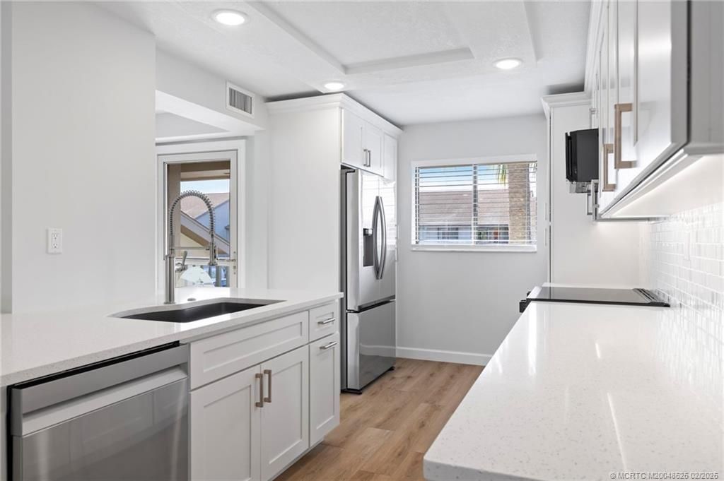 Photo of 1600 NE Dixie Highway #13-206, Jensen Beach, FL 34957 (MLS # M20048525)