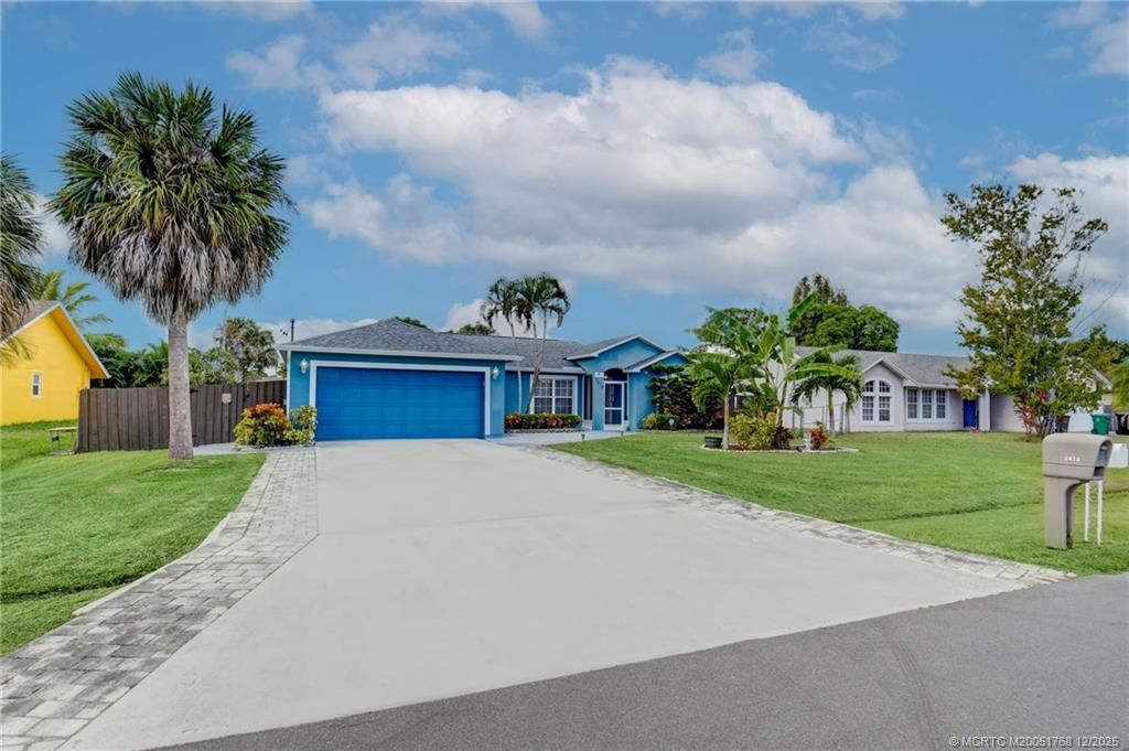 Photo of 2474 SE Marseille Street, Port Saint Lucie, FL 34952 (MLS # M20051768)