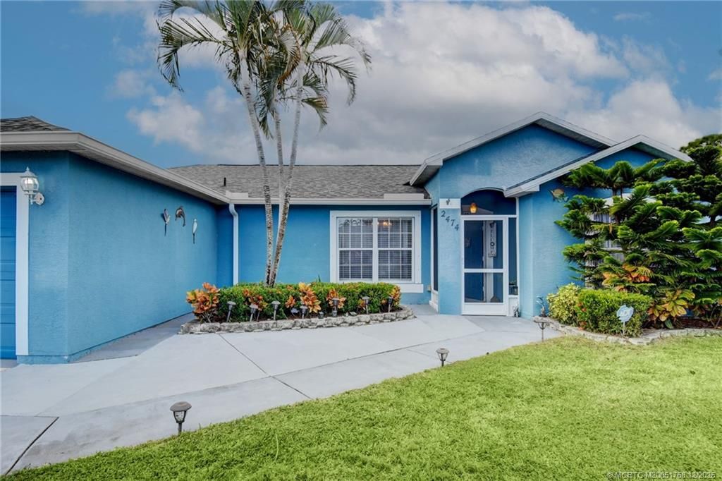 Photo of 2474 SE Marseille Street, Port Saint Lucie, FL 34952 (MLS # M20051768)