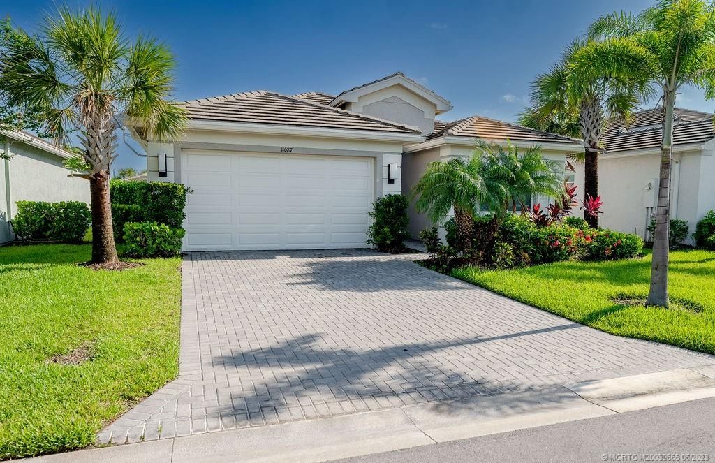 Photo of 11087 SW Carriage Hill Lane, Port Saint Lucie, FL 34987 (MLS # M20039666)