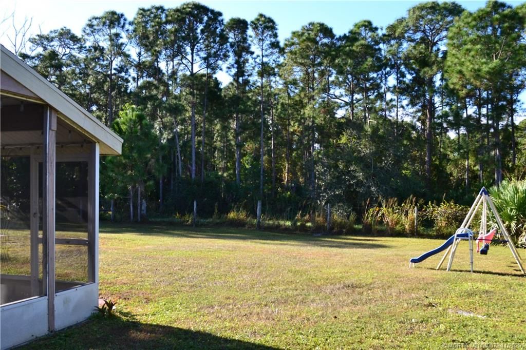 Photo of 1386 SE Oakmont Lane, Port Saint Lucie, FL 34952 (MLS # M20040872)