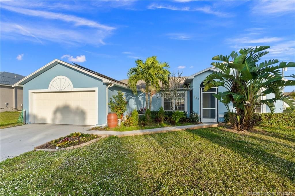 Photo of 407 SW Log Drive, Port Saint Lucie, FL 34953 (MLS # M20042150)