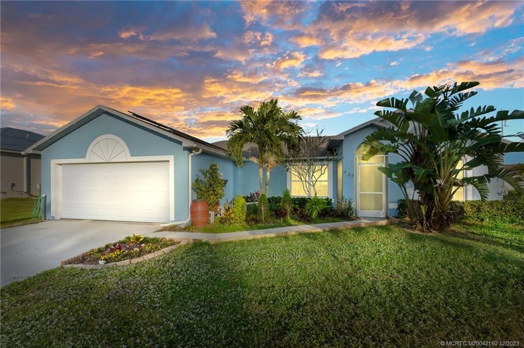 Photo of 407 SW Log Drive, Port Saint Lucie, FL 34953 (MLS # M20042150)