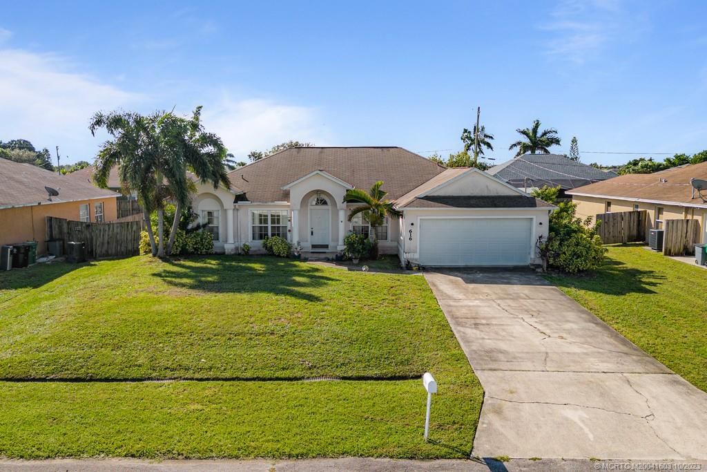 Photo of 616 SW Jaffe Avenue, Port Saint Lucie, FL 34953 (MLS # M20041603)