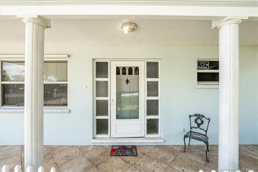 Photo of 303 W Arbor Avenue, Port Saint Lucie, FL 34952 (MLS # M20050720)