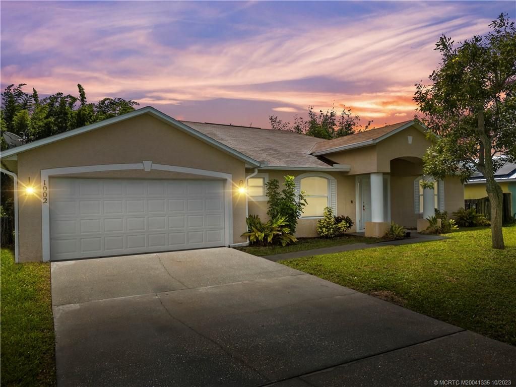 Photo of 1002 SW Mccall Road, Port Saint Lucie, FL 34953 (MLS # M20041335)