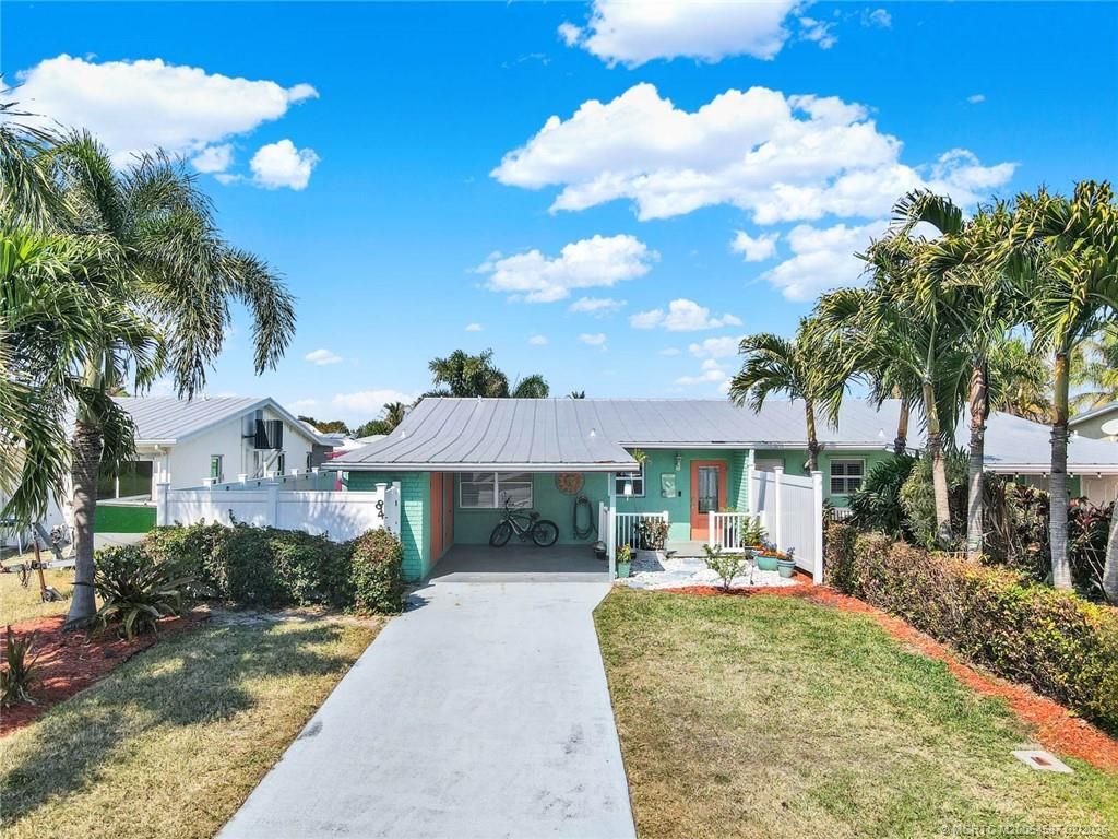 Photo of 84 Aqua Ra Drive, Jensen Beach, FL 34957 (MLS # M20054587)