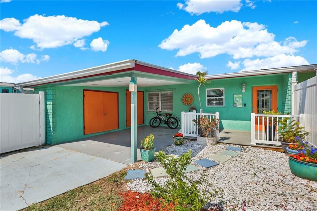 Photo of 84 Aqua Ra Drive, Jensen Beach, FL 34957 (MLS # M20054587)