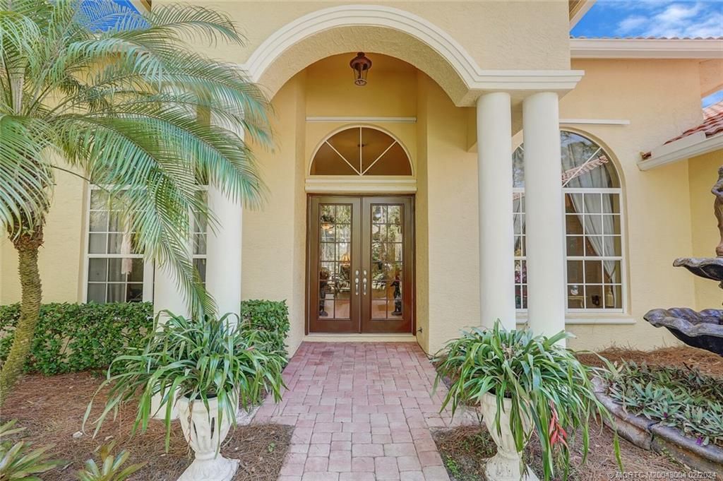 Photo of 113 NE Charleston Oaks Drive, Port Saint Lucie, FL 34983 (MLS # M20043004)