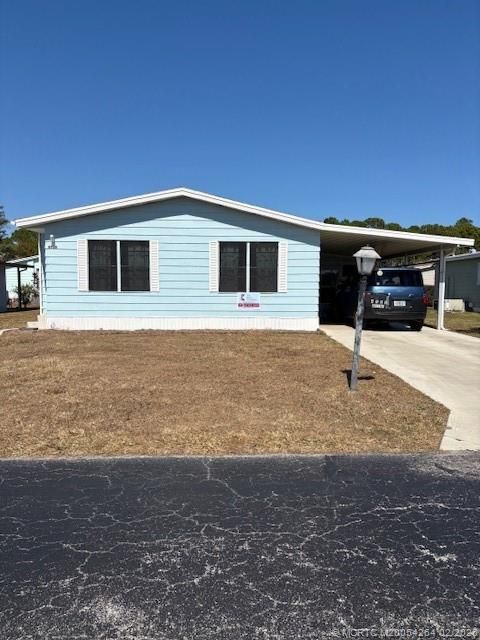 Photo of 4705 SE Dogwood Terrace, Stuart, FL 34997 (MLS # M20054264)