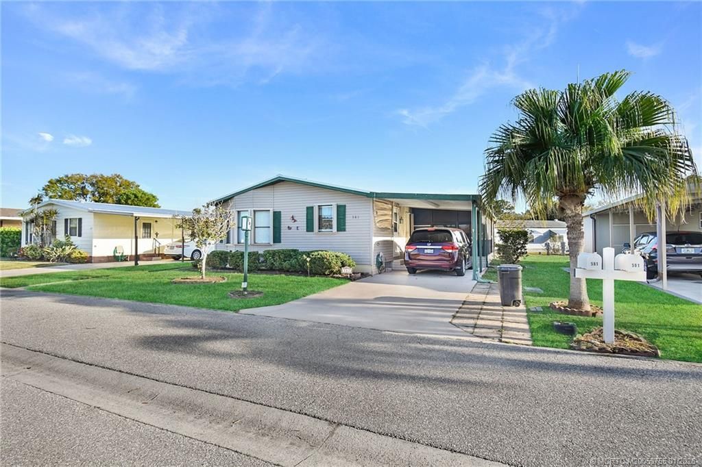 Photo of 581 Barb Ann Lane, Port Saint Lucie, FL 34952 (MLS # M20053755)