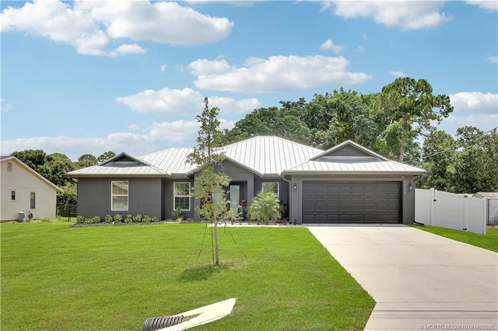 Photo of 5708 Tangelo Drive, Fort Pierce, FL 34982 (MLS # M20051019)