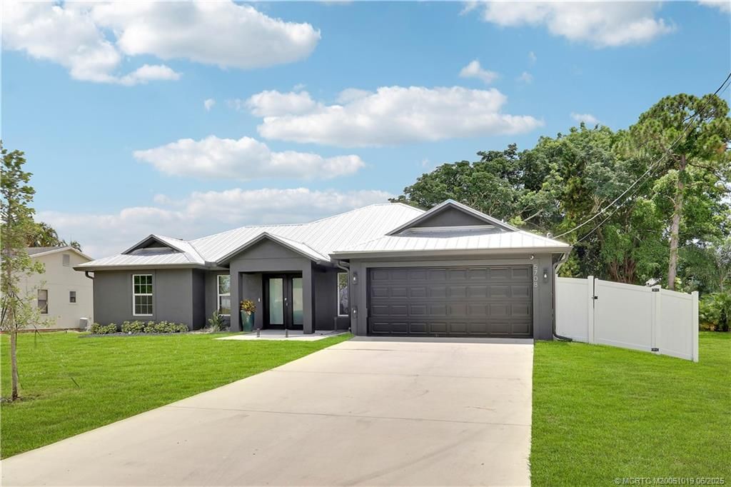 Photo of 5708 Tangelo Drive, Fort Pierce, FL 34982 (MLS # M20051019)