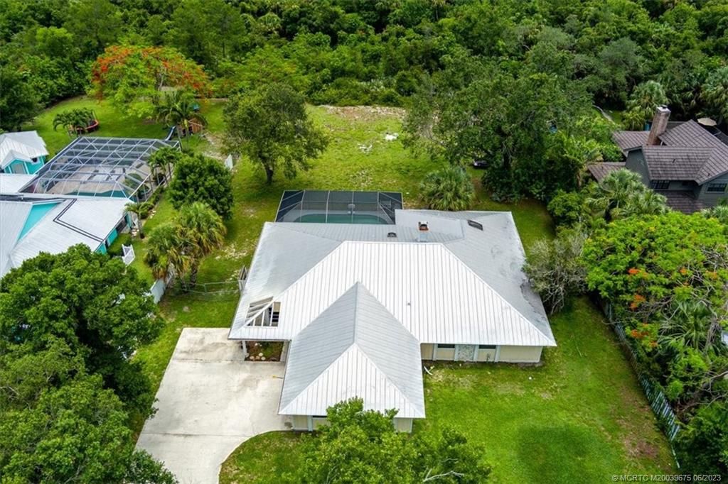 Photo of 1840 SW Crane Creek Avenue, Palm City, FL 34990 (MLS # M20039675)