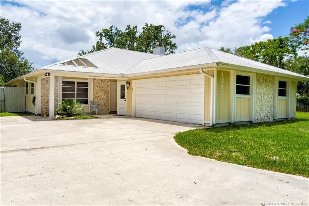 Photo of 1840 SW Crane Creek Avenue, Palm City, FL 34990 (MLS # M20039675)