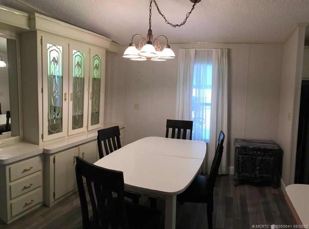 Photo of 16105 SW Indianwood Circle CIR #J-30, Indiantown, FL 34956 (MLS # M20055641)