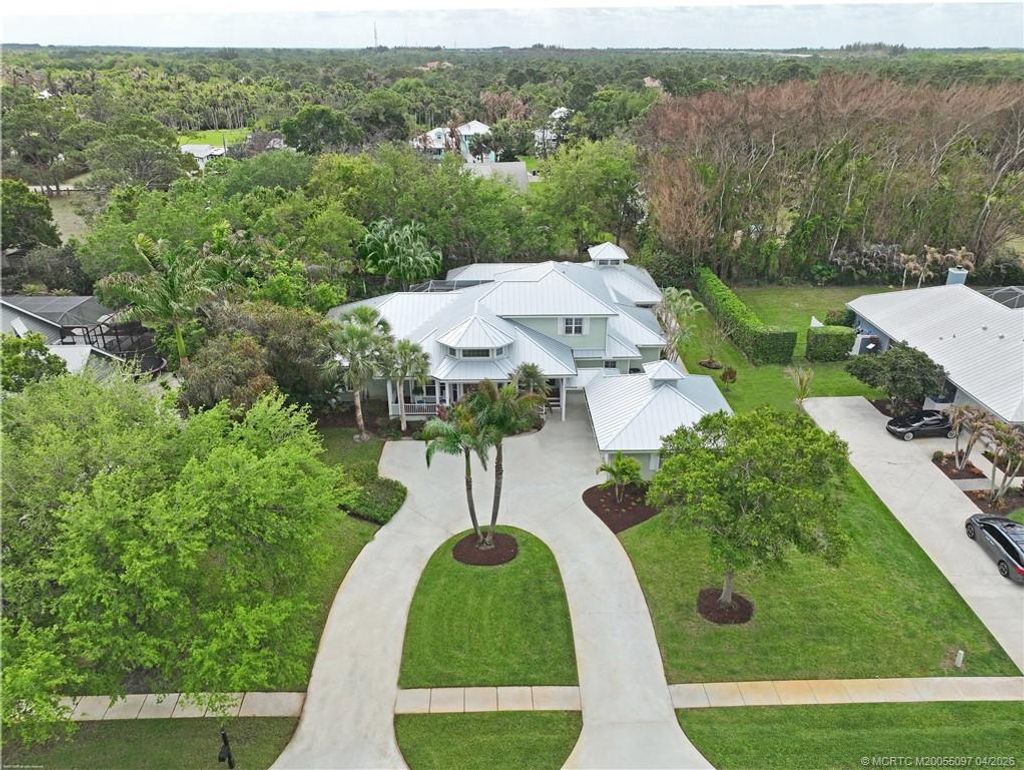 Photo of 5661 SW Orchid Bay Drive, Palm City, FL 34990 (MLS # M20055097)