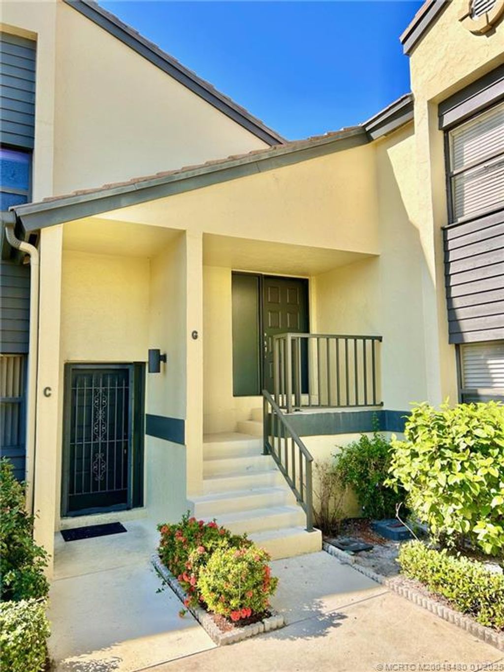 Photo of 3931 SW Greenwood Way #G, Palm City, FL 34990 (MLS # M20048480)