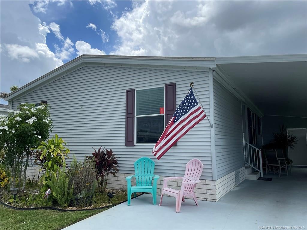 Photo of 4496 Sweetwood Way SE, Stuart, FL 34997 (MLS # M20046393)