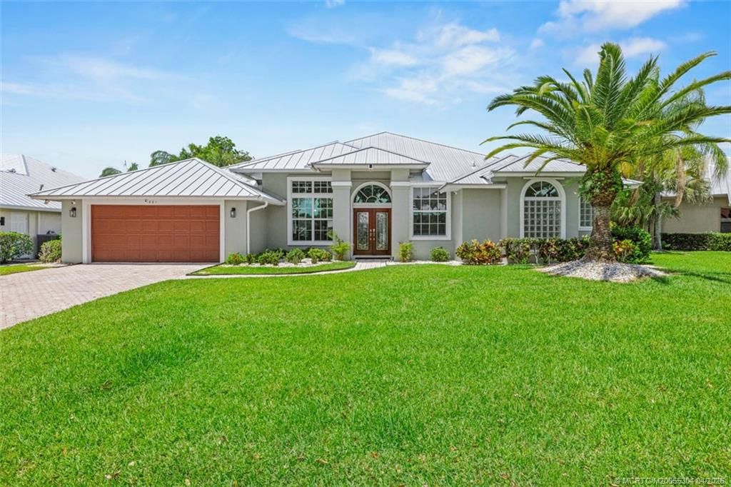 Photo of 801 SW Lighthouse Drive, Palm City, FL 34990 (MLS # M20055304)