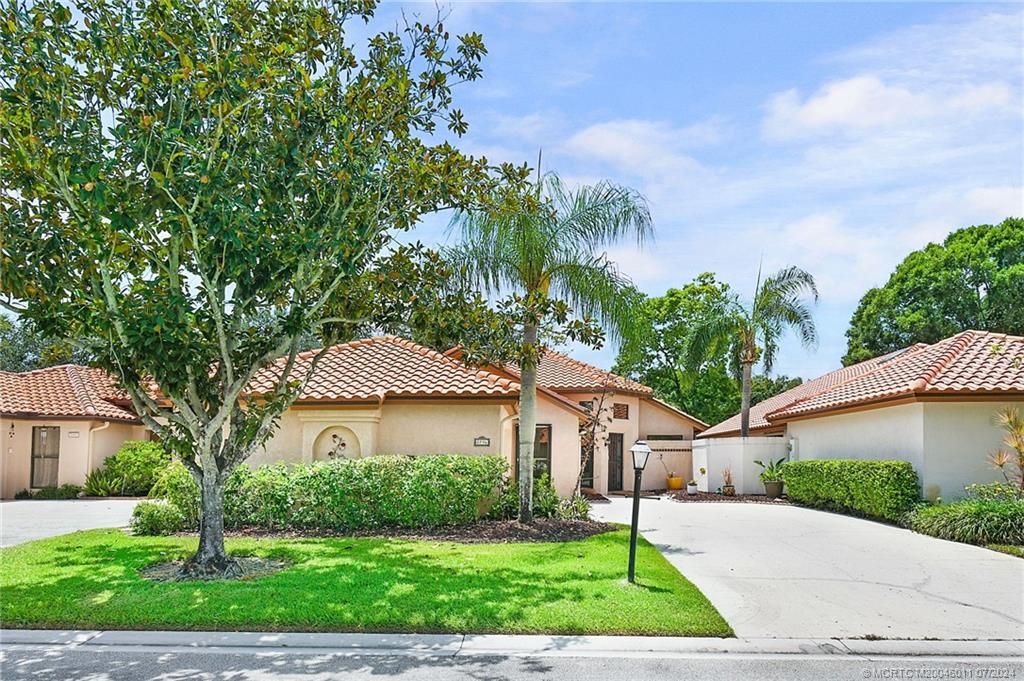 Photo of 2796 SW Mariposa Circle, Palm City, FL 34990 (MLS # M20046011)