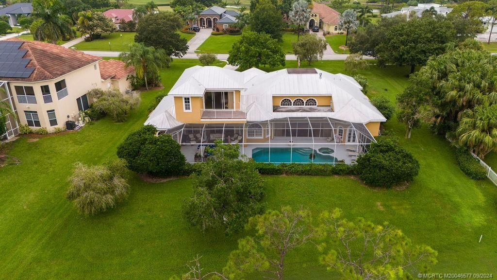 Photo of 10567 SW Whooping Crane Way, Palm City, FL 34990 (MLS # M20046577)