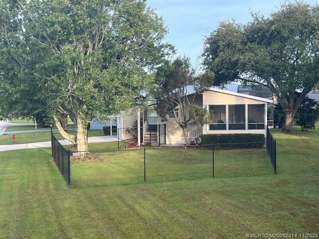 Photo of 2671 SW Versailles Terrace, Stuart, FL 34997 (MLS # M20052014)