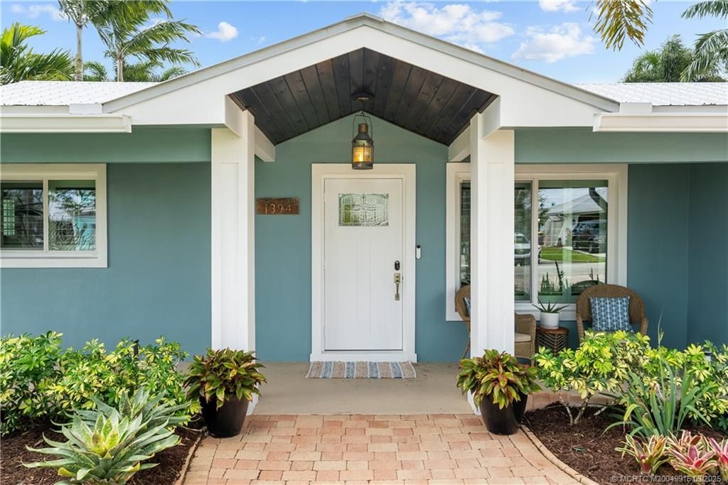 Photo of 1394 SW Seagull Way, Palm City, FL 34990 (MLS # M20049915)