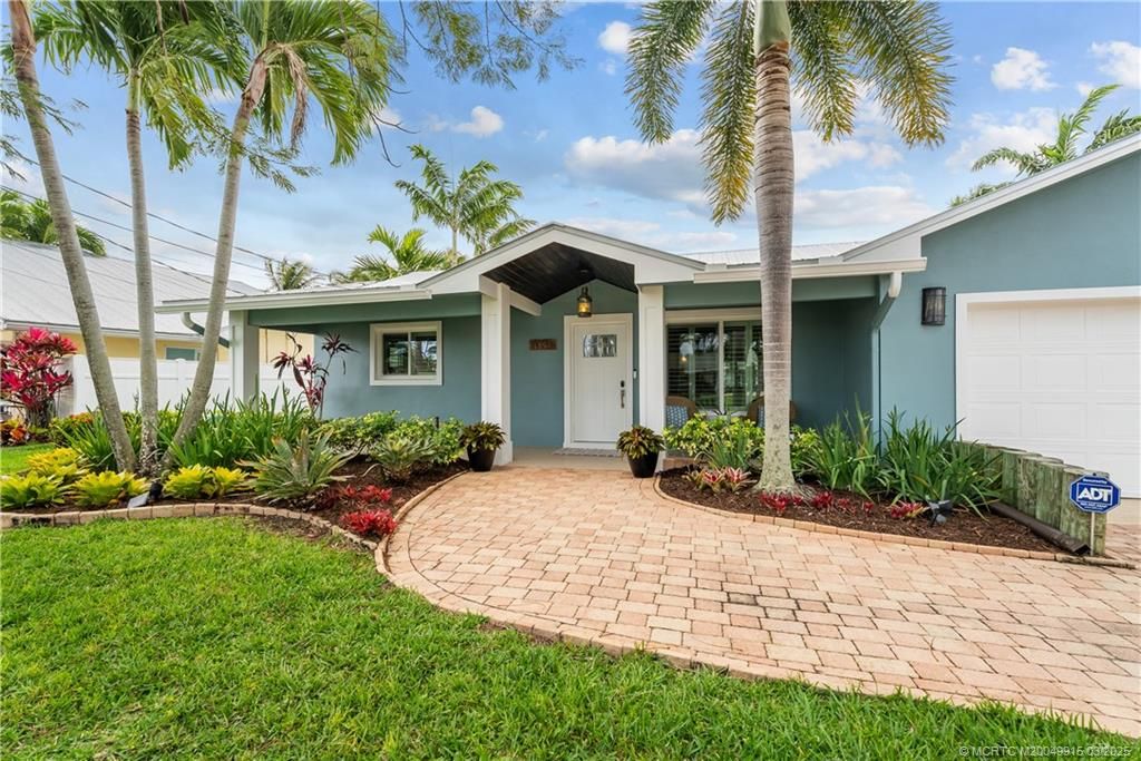 Photo of 1394 SW Seagull Way, Palm City, FL 34990 (MLS # M20049915)