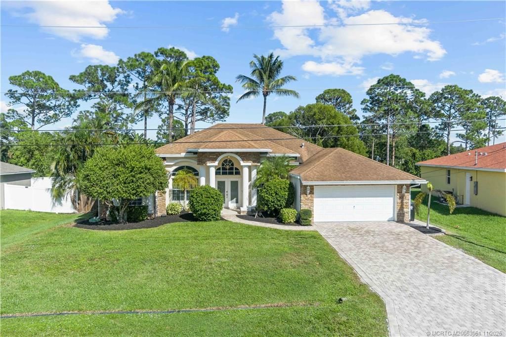 Photo of 4213 SW Utterback Street, Port Saint Lucie, FL 34953 (MLS # M20053051)