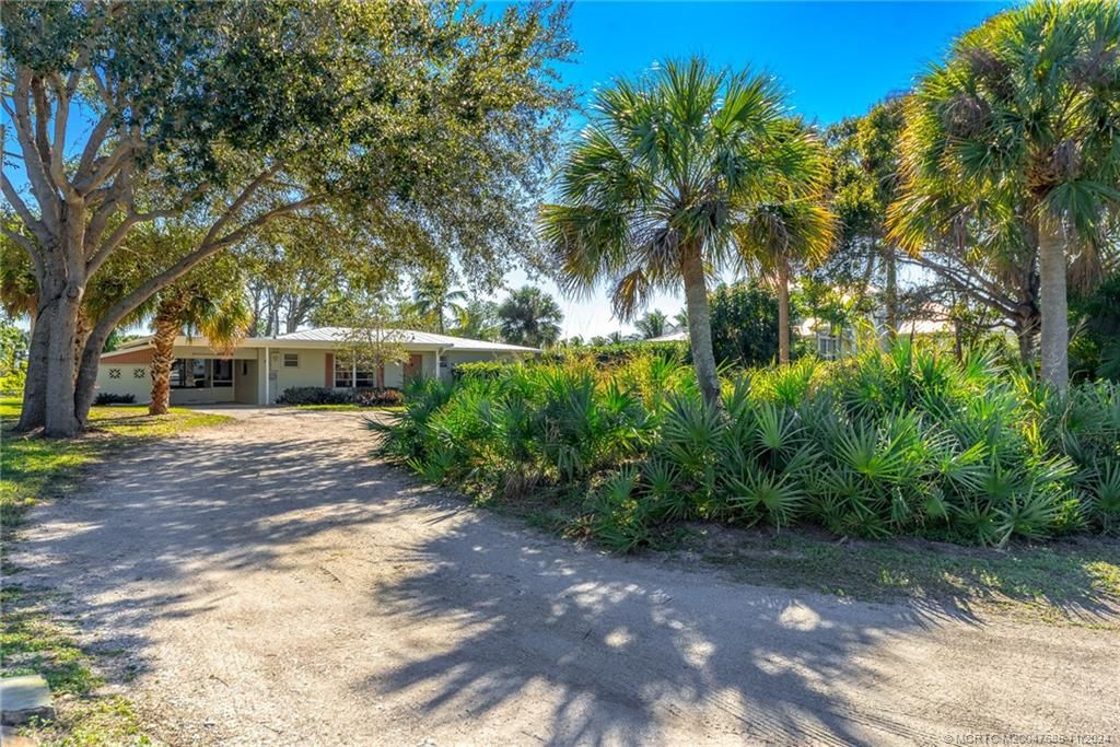 Photo of 5874 SE Horseshoe Point Road, Stuart, FL 34997 (MLS # M20047685)