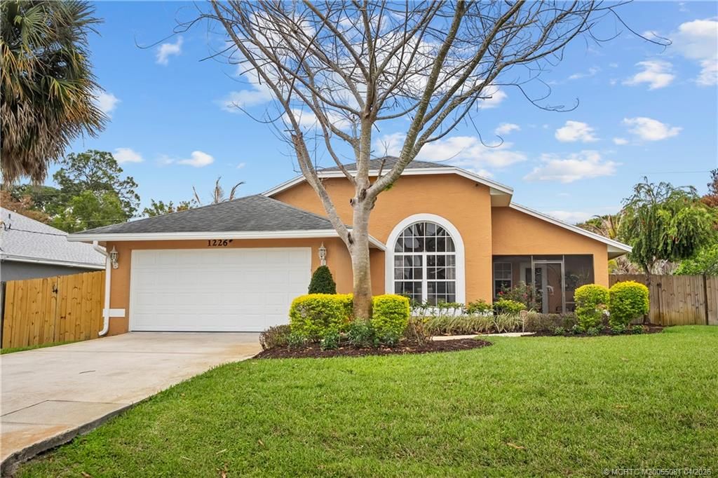 Photo of 1226 SW Melrose Avenue, Port Saint Lucie, FL 34953 (MLS # M20055081)