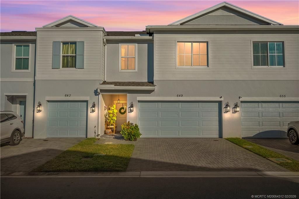 Photo of 649 NE Waters Edge Lane, Port Saint Lucie, FL 34983 (MLS # M20054312)