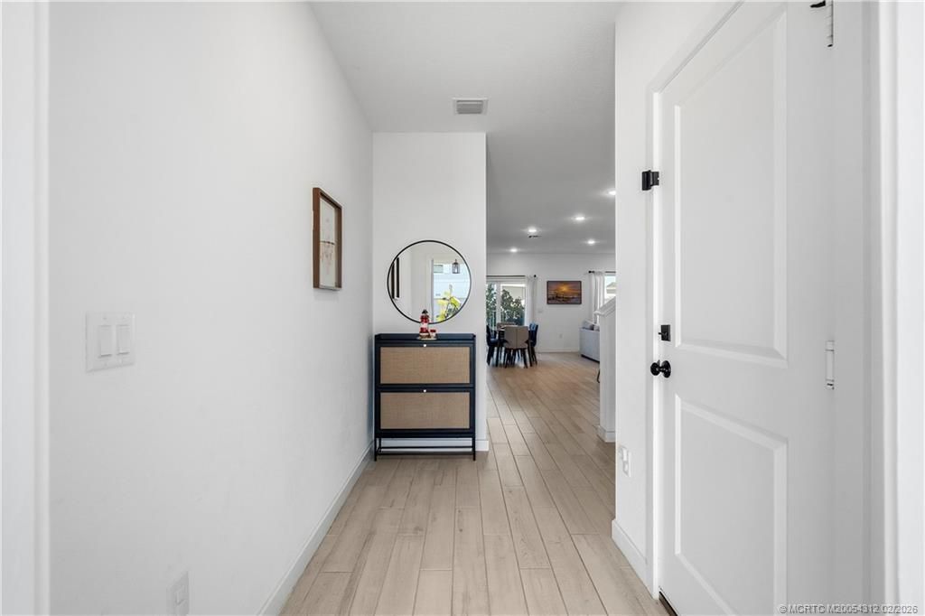 Photo of 649 NE Waters Edge Lane, Port Saint Lucie, FL 34983 (MLS # M20054312)