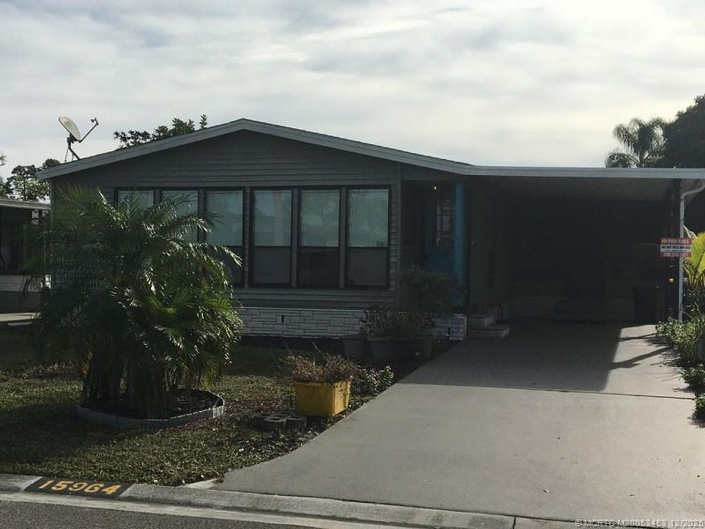 Photo of 15964 SW Indianwood Circle, Indiantown, FL 34956 (MLS # M20053453)