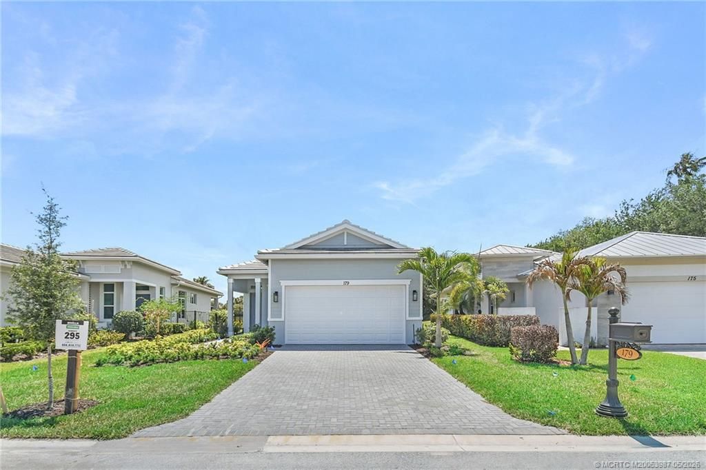 Photo of 179 SE Via Tirso, Port Saint Lucie, FL 34952 (MLS # M20053987)