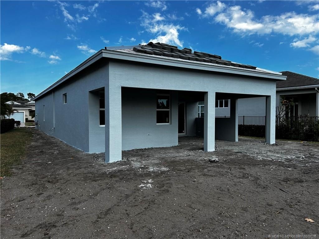Photo of 179 SE Via Tirso, Port Saint Lucie, FL 34952 (MLS # M20053987)