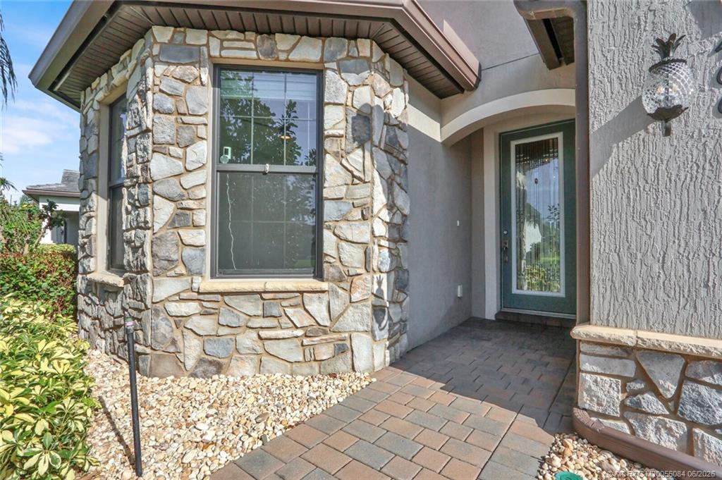 Photo of 466 SE Vallarta Drive, Port Saint Lucie, FL 34984 (MLS # M20056084)