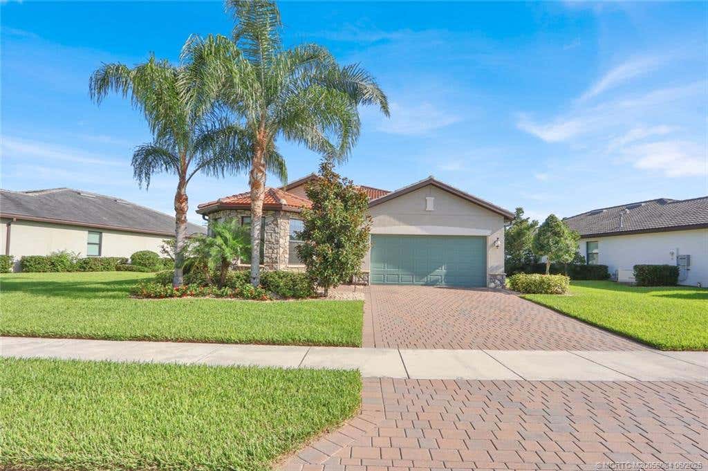 Photo of 466 SE Vallarta Drive, Port Saint Lucie, FL 34984 (MLS # M20056084)