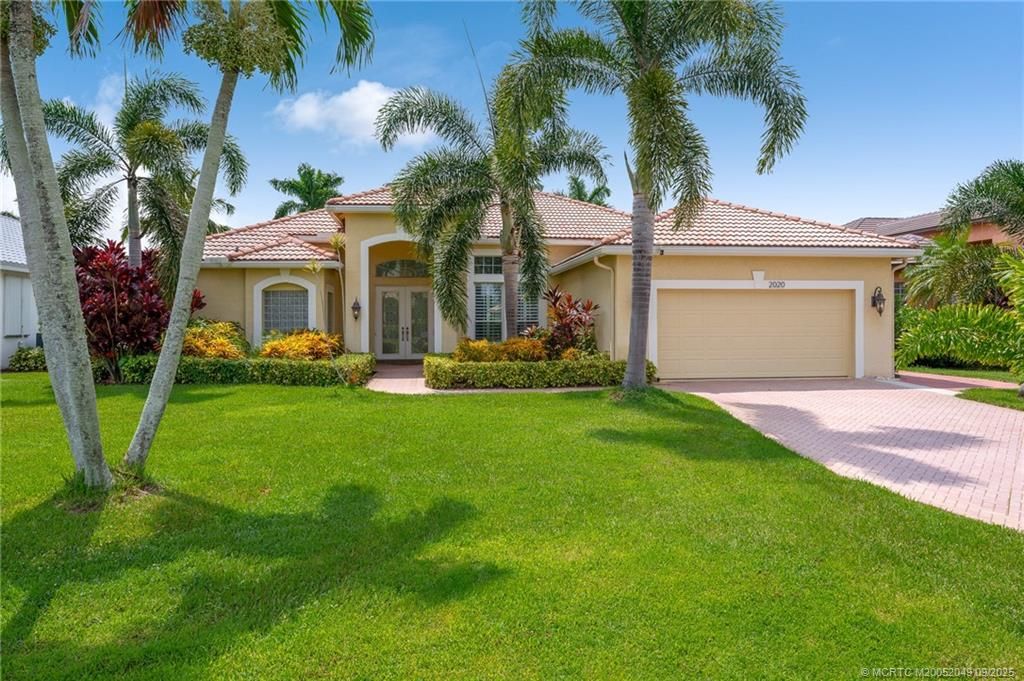 Photo of 2020 SE Oxton Drive, Port Saint Lucie, FL 34952 (MLS # M20052049)