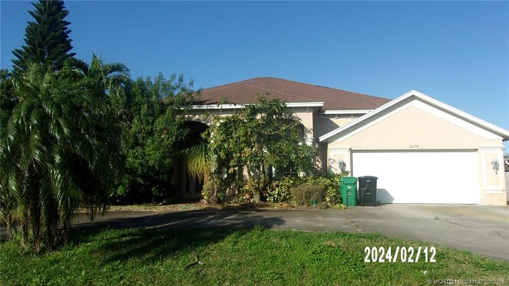 Photo of 2074 SW Beauregard Street, Port Saint Lucie, FL 34953 (MLS # M20043182)