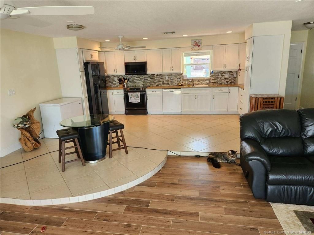 Photo of 1434 SW Egret Way, Palm City, FL 34990 (MLS # M20039078)