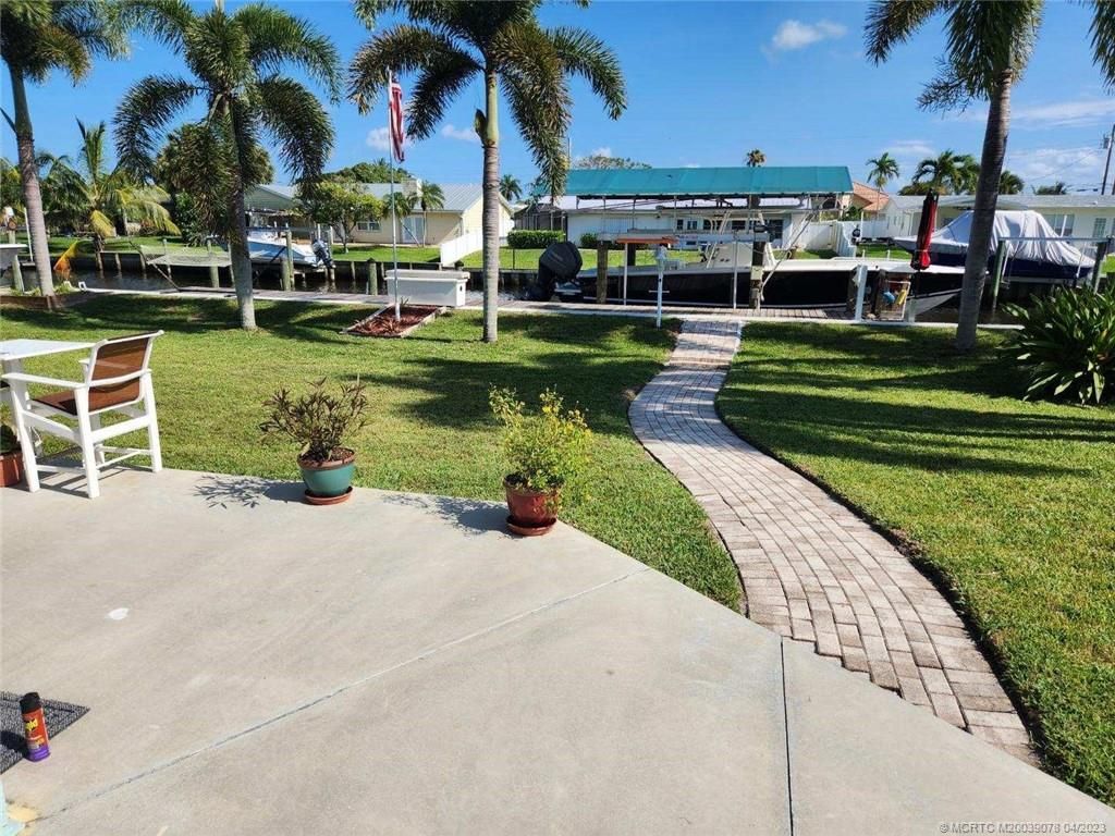 Photo of 1434 SW Egret Way, Palm City, FL 34990 (MLS # M20039078)