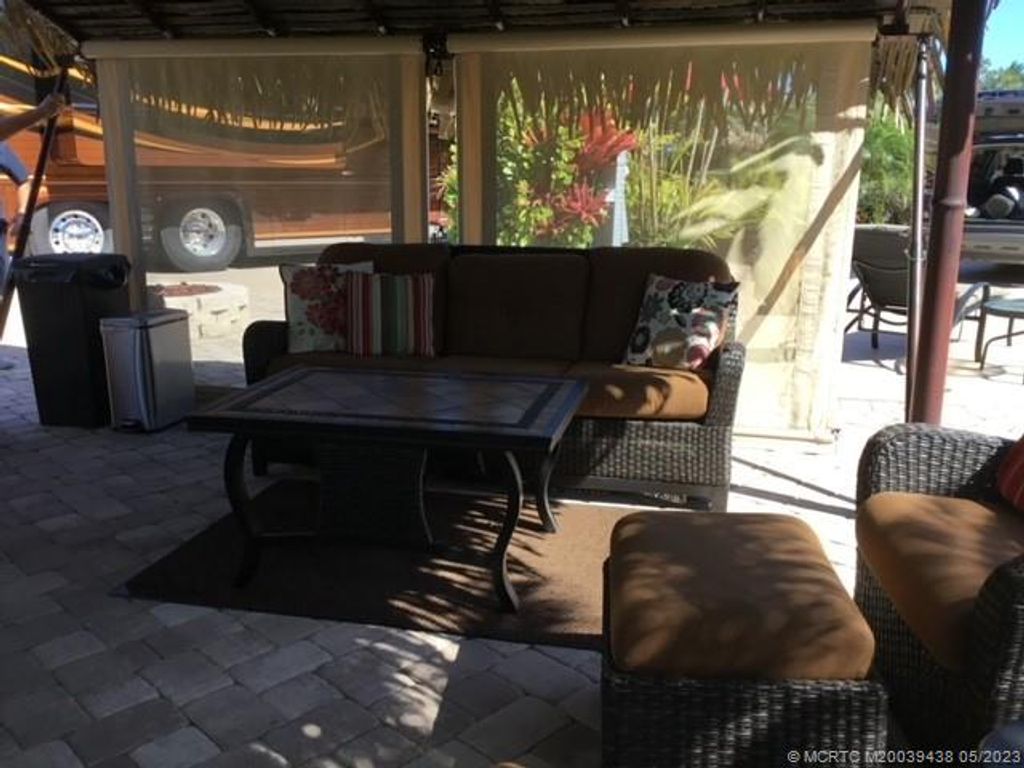 Photo of 440 NW Sandtrap Lane, Port Saint Lucie, FL 34986 (MLS # M20039438)