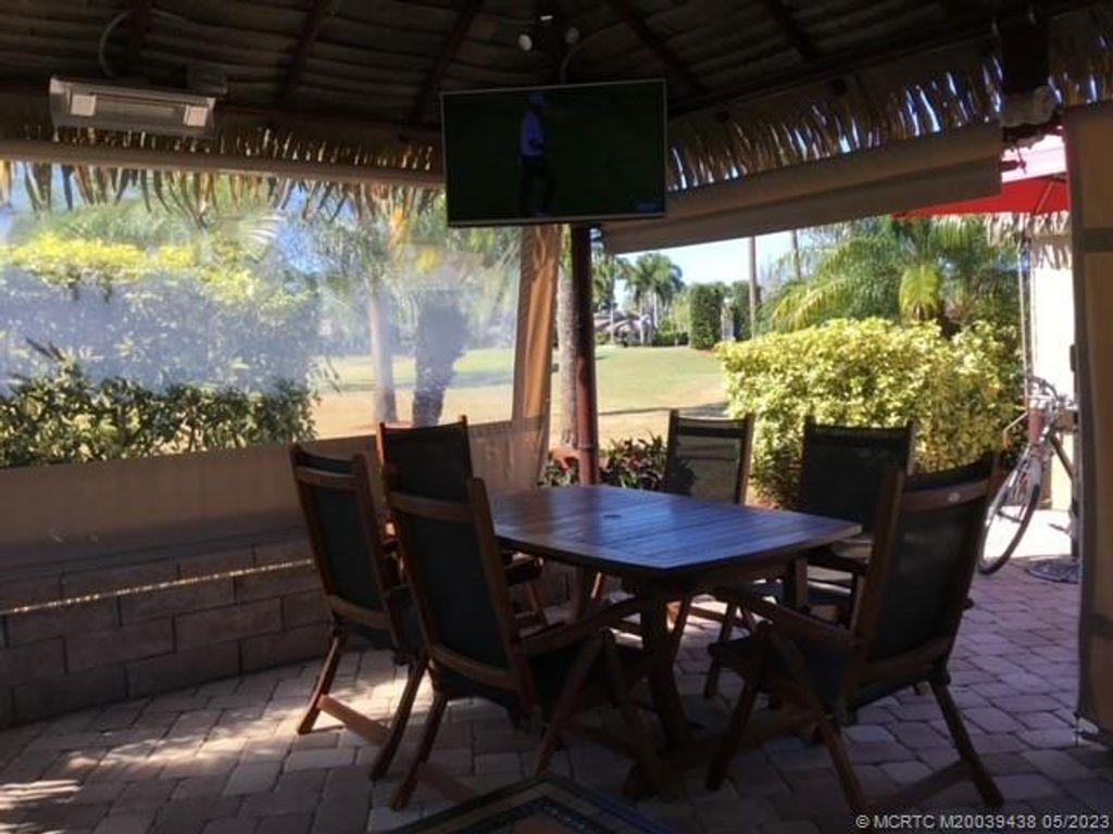 Photo of 440 NW Sandtrap Lane, Port Saint Lucie, FL 34986 (MLS # M20039438)